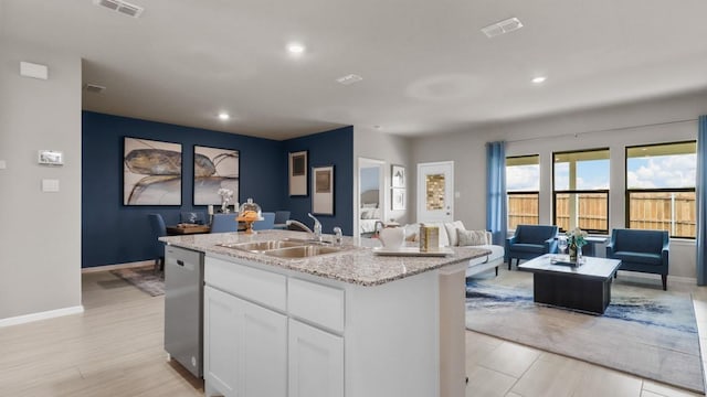 4109 Azam Ln, Fort Worth, TX 76036 - kitchen with a sink, dishwasher, open floor plan, white cabinets, and an island with sink
