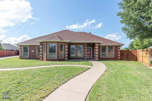 7118 Sable Cir, Abilene, TX 79606 - back of house featuring brick siding, roof with shingles, and french doors