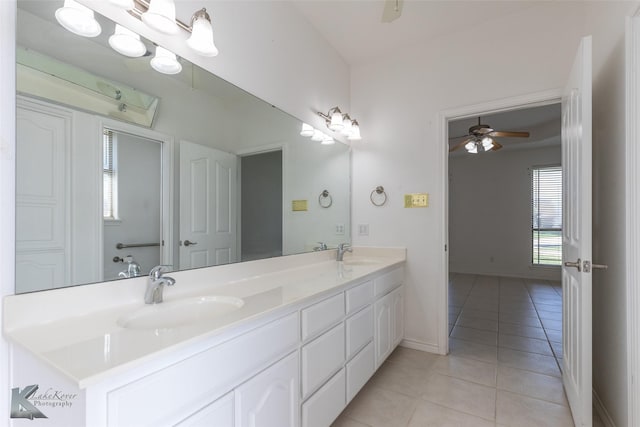 7118 Sable Cir, Abilene, TX 79606 - full bath with tile patterned flooring, ceiling fan, double vanity, and baseboards