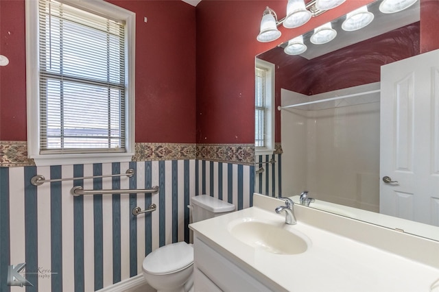 7118 Sable Cir, Abilene, TX 79606 - full bath featuring wainscoting, a shower, toilet, and vanity
