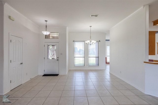 7118 Sable Cir, Abilene, TX 79606 - foyer featuring a chandelier, ornamental molding, baseboards, and light tile patterned floors