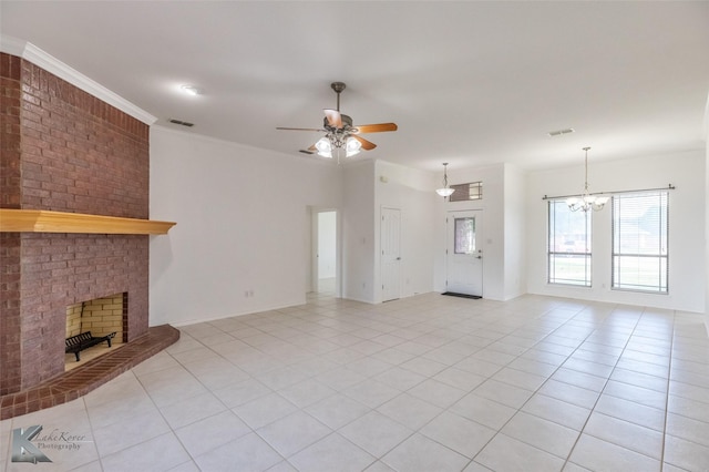 7118 Sable Cir, Abilene, TX 79606 - unfurnished living room featuring a brick fireplace, a chandelier, light tile patterned flooring, and ceiling fan