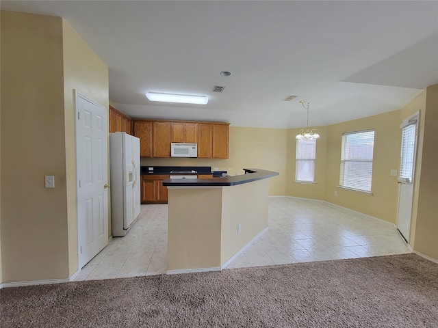 1006 Redwood Trl, Rockwall, TX 75087 - kitchen featuring white appliances, light tile patterned flooring, a chandelier, and light colored carpet