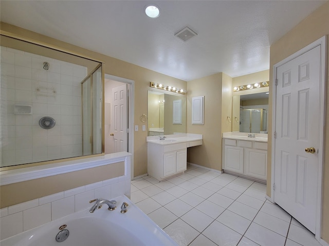 1006 Redwood Trl, Rockwall, TX 75087 - full bathroom with a garden tub, tile patterned floors, vanity, and a shower