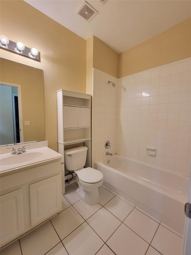 1006 Redwood Trl, Rockwall, TX 75087 - bathroom featuring toilet, tile patterned floors, vanity, and shower / tub combination