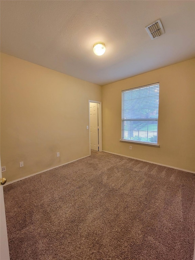 1006 Redwood Trl, Rockwall, TX 75087 - empty room with carpet and baseboards