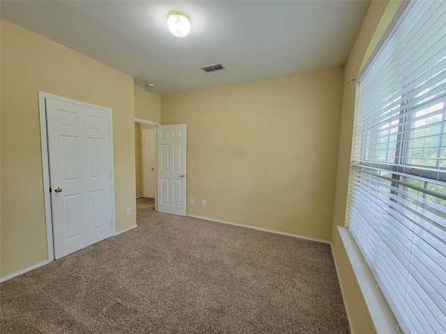 1006 Redwood Trl, Rockwall, TX 75087 - unfurnished bedroom featuring carpet floors and baseboards