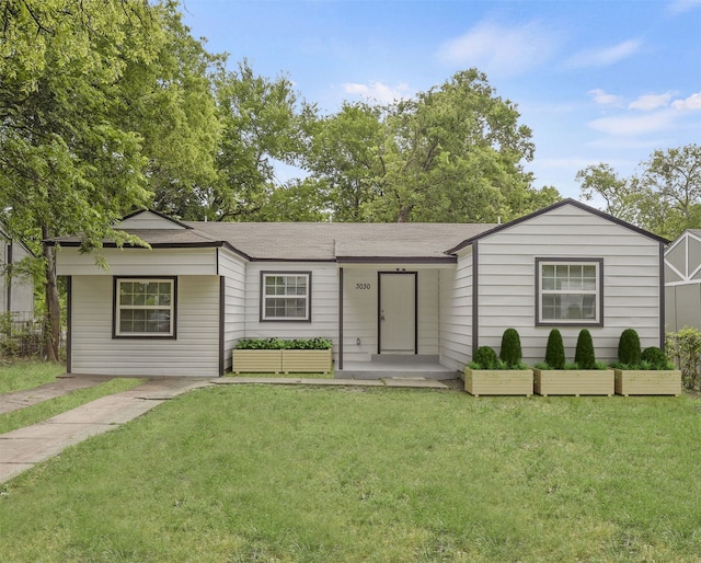 3030 Utah Ave, Dallas, TX 75216 - single story home featuring a front lawn and roof with shingles