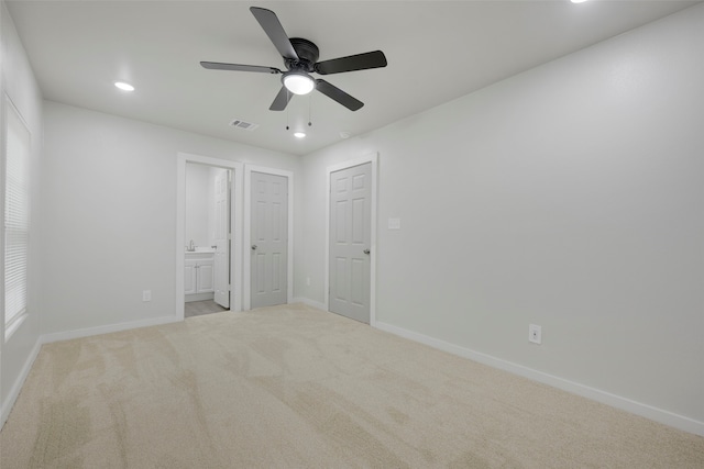 3030 Utah Ave, Dallas, TX 75216 - unfurnished bedroom with carpet, baseboards, recessed lighting, connected bathroom, and ceiling fan