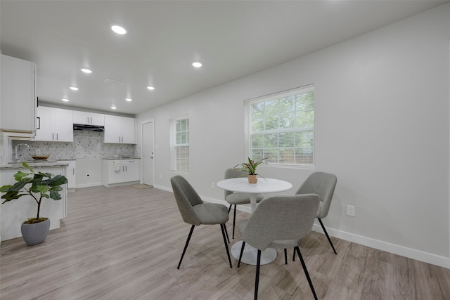 3030 Utah Ave, Dallas, TX 75216 - dining room featuring light wood-type flooring, baseboards, and recessed lighting