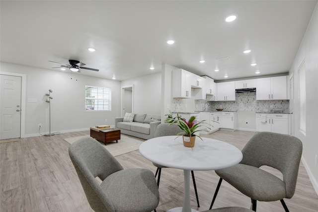 3030 Utah Ave, Dallas, TX 75216 - dining space with light wood-type flooring, ceiling fan, baseboards, and recessed lighting