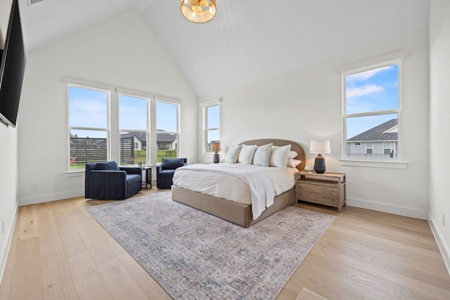 1914 Mann Pkwy, Celina, TX 75009 - bedroom featuring high vaulted ceiling, baseboards, and wood-type flooring