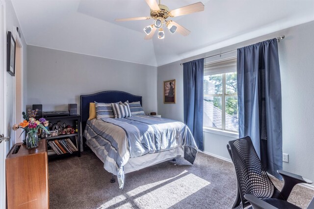 bedroom with carpet, ceiling fan, baseboards, and lofted ceiling