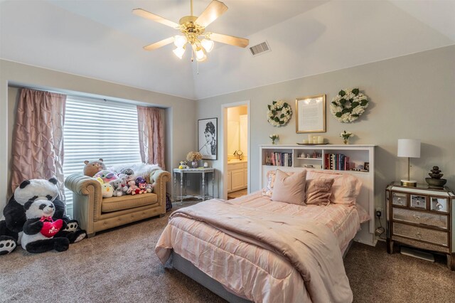 carpeted bedroom with lofted ceiling, ensuite bathroom, and ceiling fan