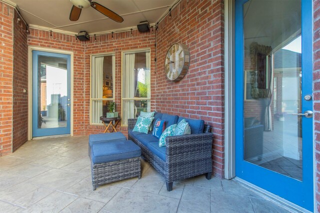 view of patio featuring ceiling fan