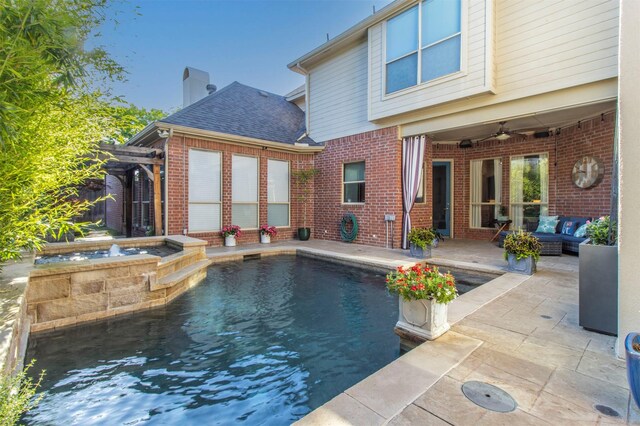view of swimming pool with a patio area, a ceiling fan, outdoor lounge area, a pergola, and a pool with connected hot tub