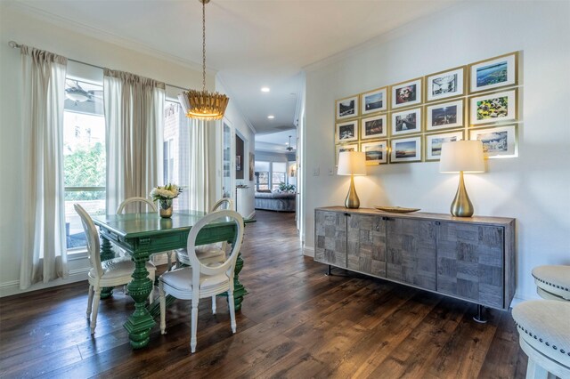 dining area featuring ornamental molding, wood finished floors, baseboards, a chandelier, and recessed lighting