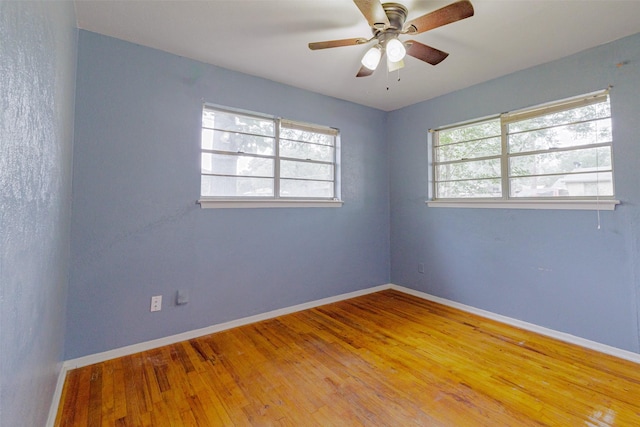 1809 Stevens St, Bridgeport, TX 76426 - empty room featuring wood finished floors, baseboards, and ceiling fan