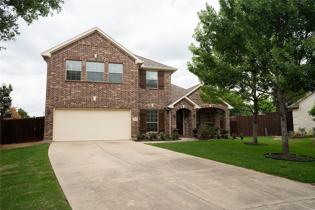 2974 Sparks Dr, Frisco, TX 75036 - traditional-style house featuring an attached garage, brick siding, and concrete driveway