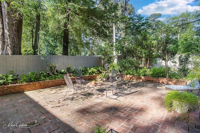 6030 Arden St, Shreveport, LA 71106 - fenced backyard with a patio