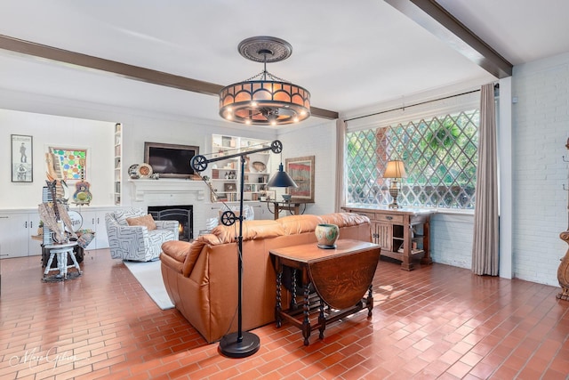 6030 Arden St, Shreveport, LA 71106 - living room featuring brick flooring, brick wall, and a warm lit fireplace