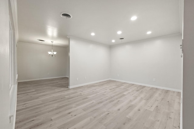 2909 Conejos Dr, Fort Worth, TX 76116 - spare room with crown molding, a chandelier, recessed lighting, light wood-style floors, and baseboards
