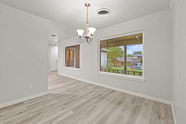 2909 Conejos Dr, Fort Worth, TX 76116 - unfurnished dining area featuring a chandelier, ornamental molding, baseboards, and light wood finished floors
