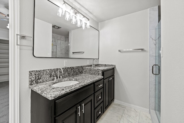2909 Conejos Dr, Fort Worth, TX 76116 - bathroom with a stall shower, marble look tile flooring, double vanity, and baseboards