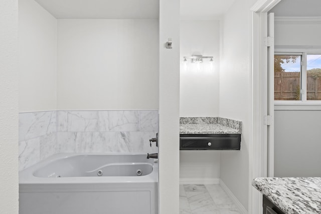 2909 Conejos Dr, Fort Worth, TX 76116 - bathroom with marble look tiles, a whirlpool tub, and baseboards