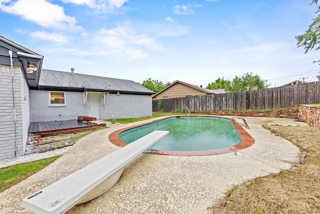 2909 Conejos Dr, Fort Worth, TX 76116 - view of pool featuring a fenced backyard, a deck, and a diving board
