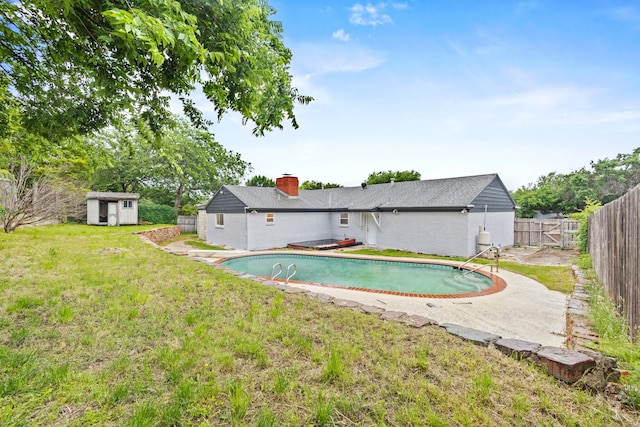 2909 Conejos Dr, Fort Worth, TX 76116 - back of property featuring a storage unit, a chimney, an outdoor structure, a gate, and a patio area