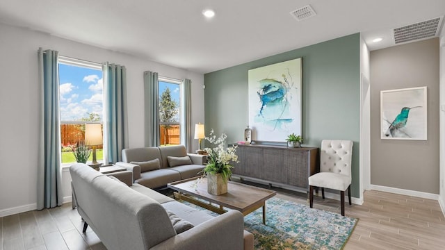 160 Trinity St, Grandview, TX 76050 - sitting room featuring baseboards, light wood-type flooring, and recessed lighting