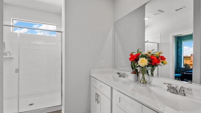 160 Trinity St, Grandview, TX 76050 - bathroom with a shower stall, healthy amount of natural light, double vanity, and ensuite bath