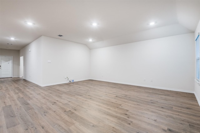 222 Redbarn Ln, Caddo Mills, TX 75135 - empty room featuring recessed lighting, wood finished floors, baseboards, and vaulted ceiling