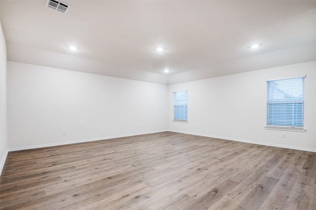 222 Redbarn Ln, Caddo Mills, TX 75135 - empty room with light wood finished floors, baseboards, and recessed lighting