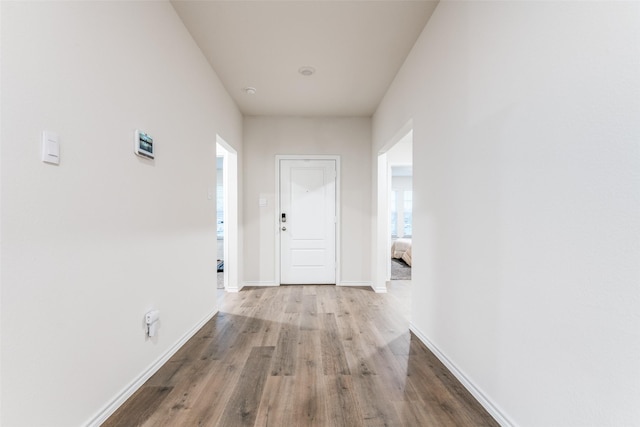 222 Redbarn Ln, Caddo Mills, TX 75135 - hall featuring wood finished floors and baseboards