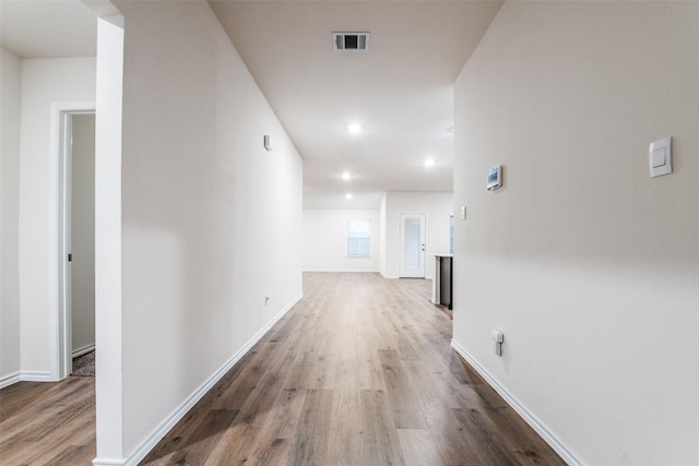222 Redbarn Ln, Caddo Mills, TX 75135 - hall featuring wood finished floors, baseboards, and recessed lighting