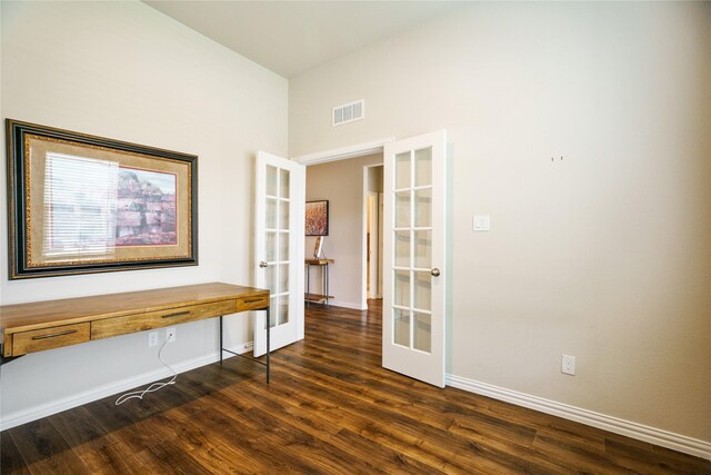 3224 Greymoore Dr, Anna, TX 75409 - empty room featuring french doors, dark wood-style floors, baseboards, and a towering ceiling