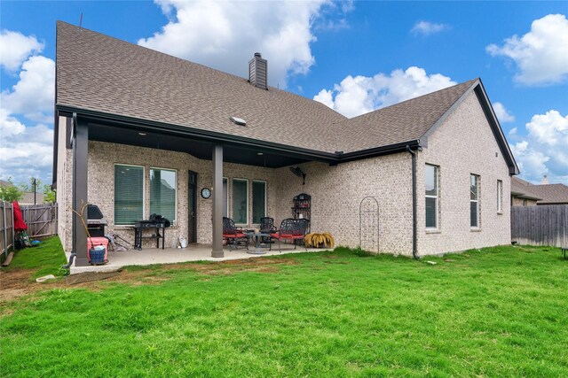 3224 Greymoore Dr, Anna, TX 75409 - rear view of house with roof with shingles, a chimney, a patio, and brick siding