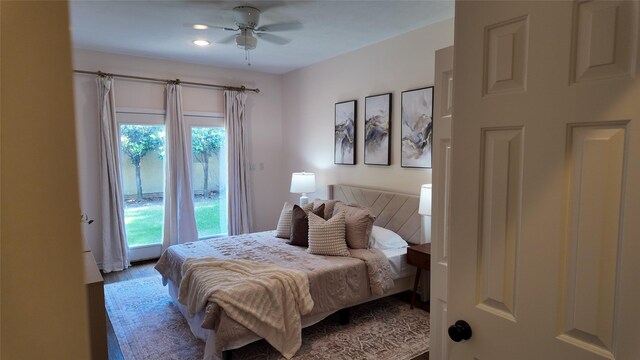 bedroom with wood finished floors and a ceiling fan
