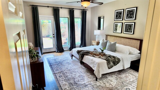bedroom with wood finished floors and ceiling fan