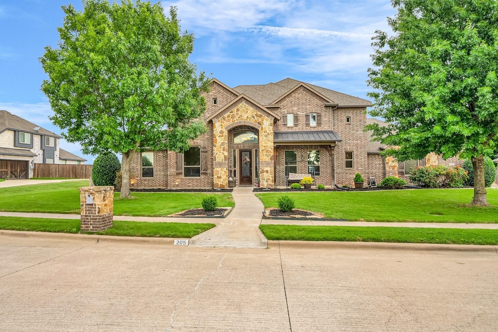 205 Panther Peak Dr, Midlothian, TX 76065 - view of front facade with brick siding and stone siding