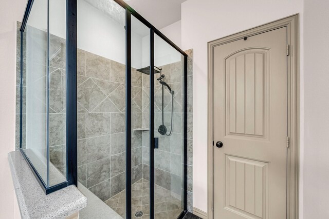 full bathroom featuring a stall shower