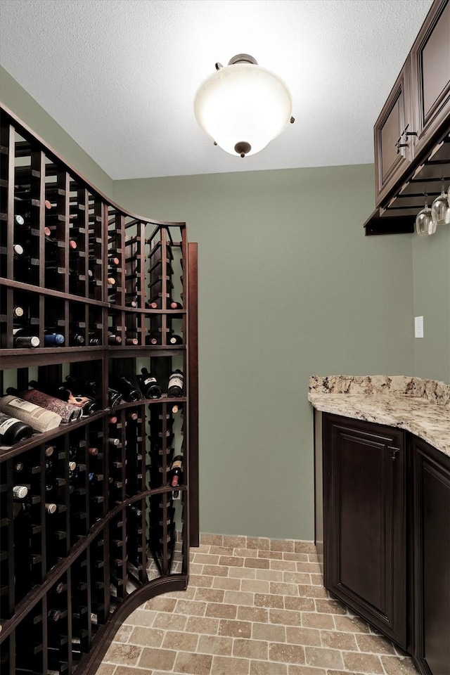 wine area with brick patterned floors