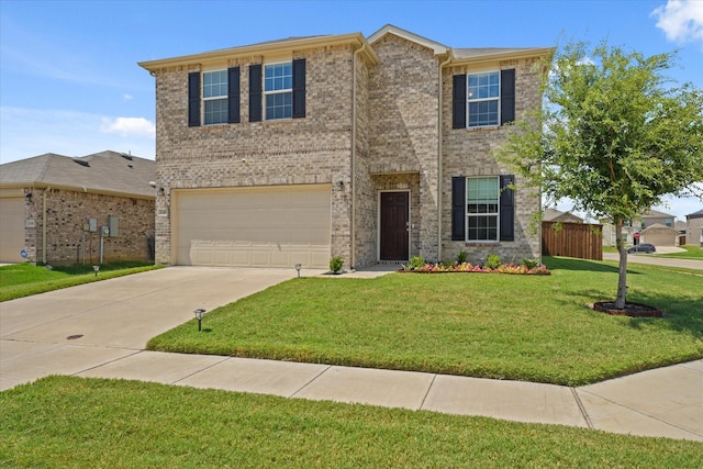 1145 Vernon Dr, Aubrey, TX 76227 - traditional-style home with concrete driveway, a garage, and brick siding