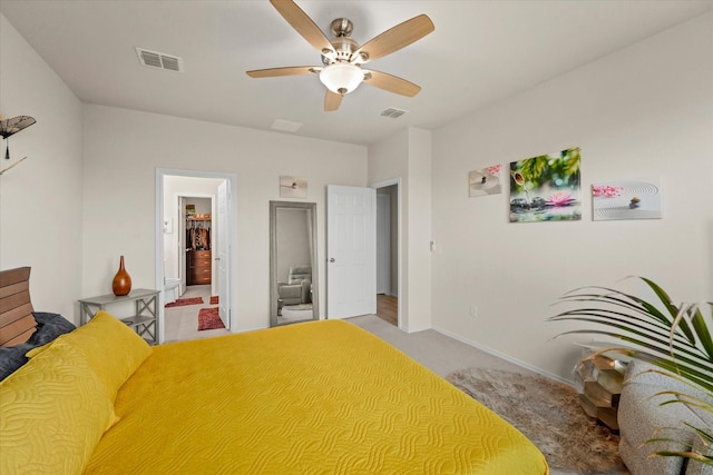 1145 Vernon Dr, Aubrey, TX 76227 - carpeted bedroom with baseboards, ensuite bath, and a ceiling fan