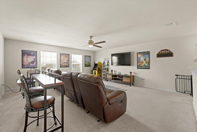 1145 Vernon Dr, Aubrey, TX 76227 - living room with light carpet, a ceiling fan, and baseboards