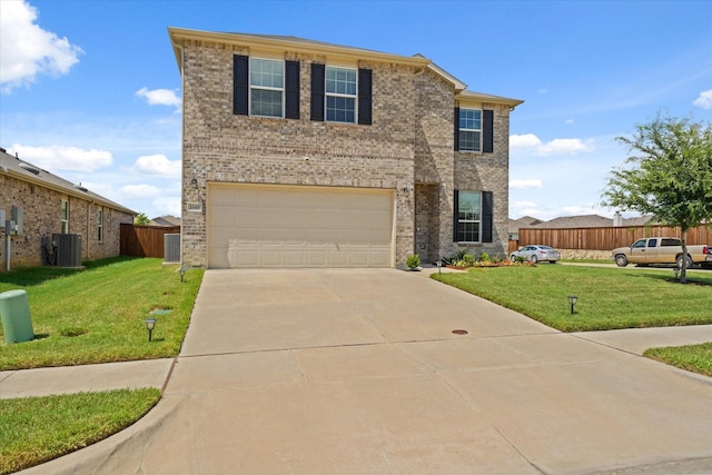 1145 Vernon Dr, Aubrey, TX 76227 - traditional-style house with a garage, concrete driveway, central AC unit, and brick siding