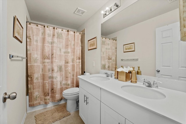 1145 Vernon Dr, Aubrey, TX 76227 - full bathroom featuring tile patterned floors, toilet, double vanity, and shower / tub combo