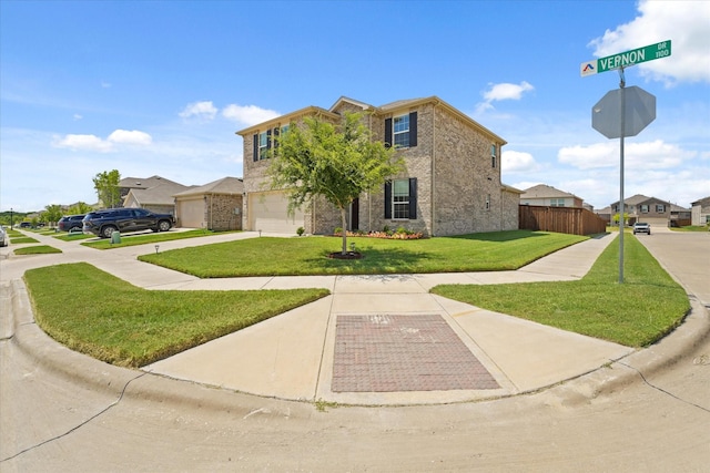 1145 Vernon Dr, Aubrey, TX 76227 - view of front of home featuring concrete driveway and an attached garage